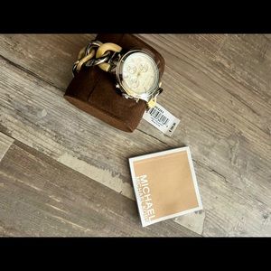 Michael Kors Ladies Watch. Never worn. Tags in. Unique chain bracelet